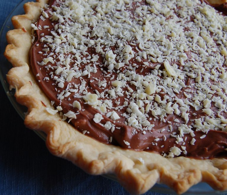 pie with chocolate filling and white chocolate shaved on top