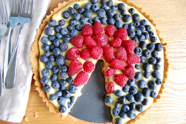 red and blue berries in round dish