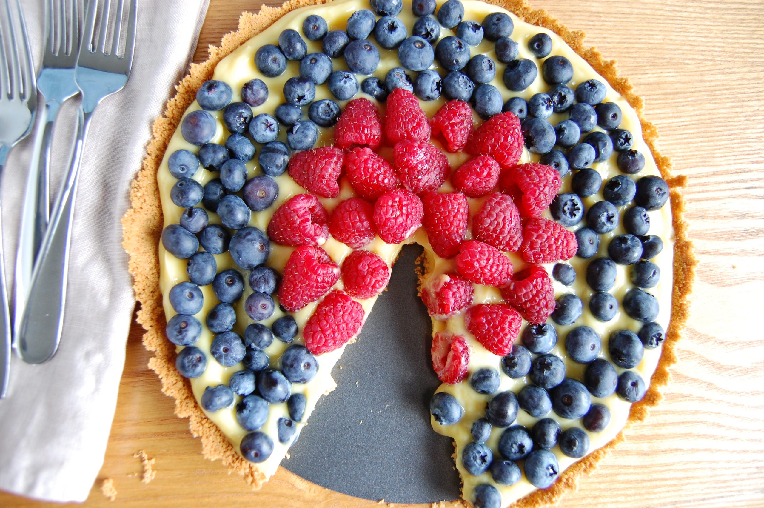 red and blue berries in round dish