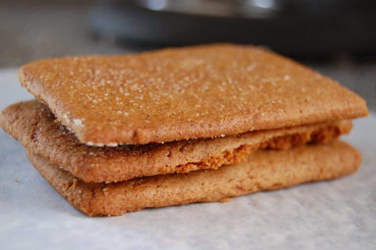 3 brown crackers on white paper