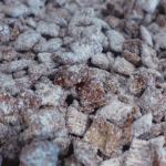 cereal coated with chocolate and powdered sugar