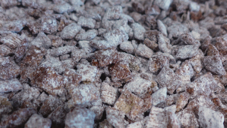 cereal coated with chocolate and powdered sugar